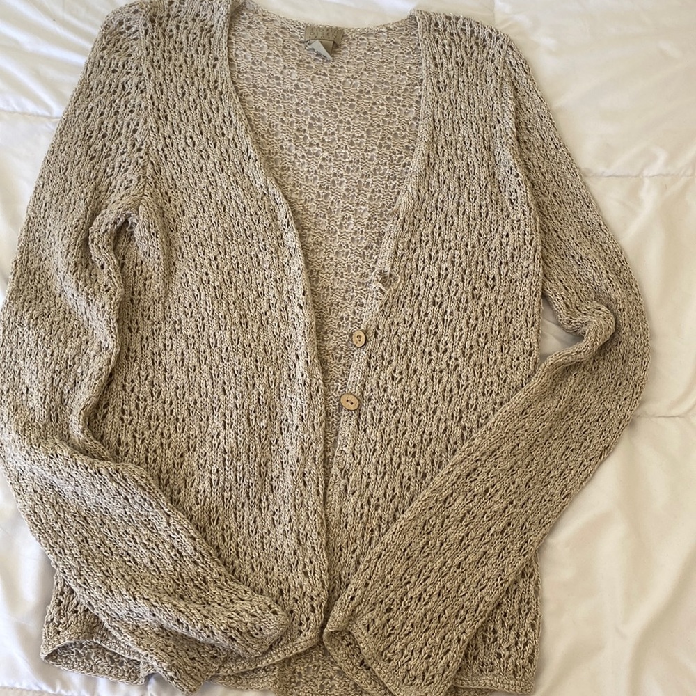 Tan and Crockett! It’s a little old and missing 2 buttons!